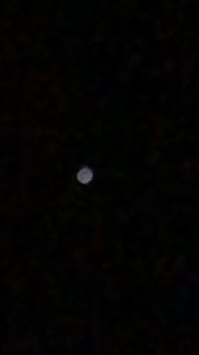 Rond licht punt veel snel naar boven gaat dan uit foto