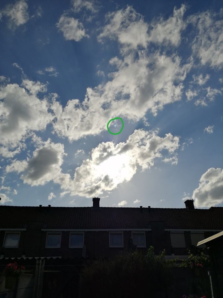 Blauwe bol met lichten of stippen foto