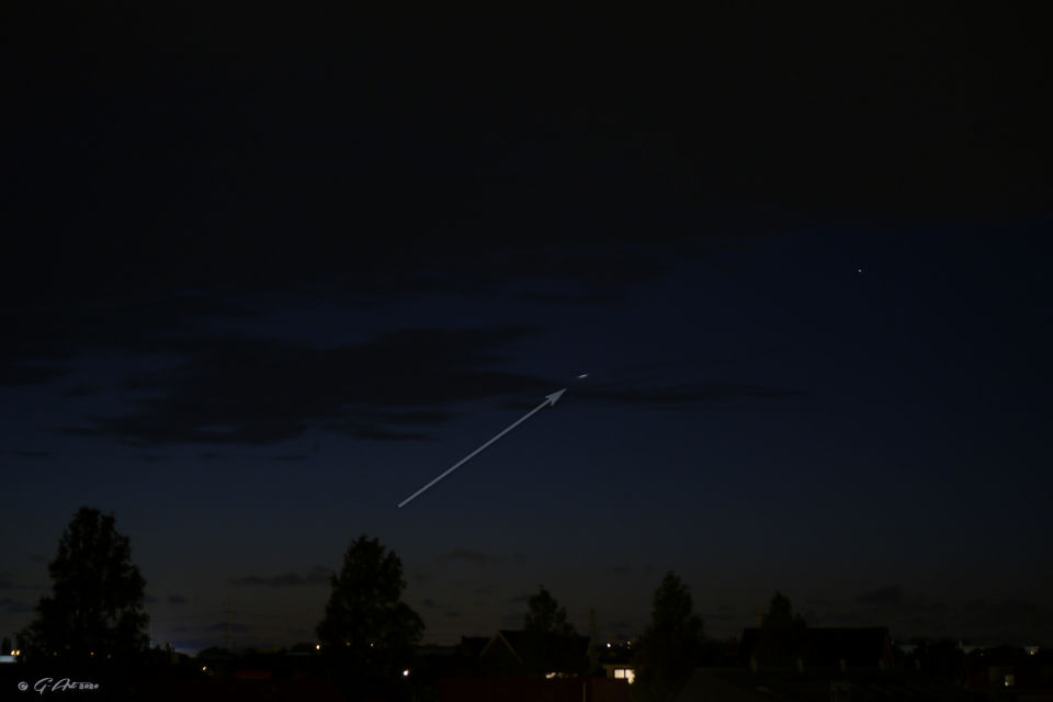 Schijfje van licht zichtbaar op 1 foto. foto