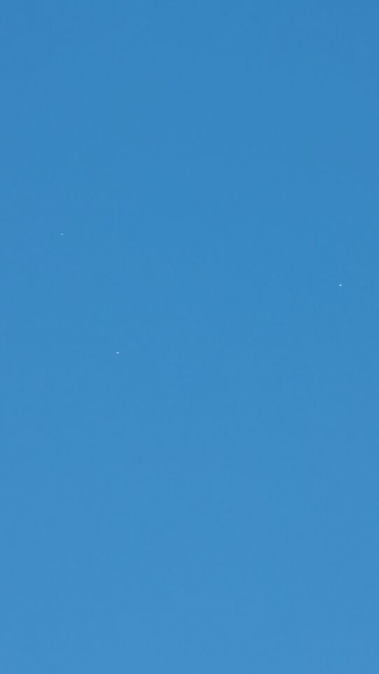 3 witte bollen bij elkaar die samen een steeds groeiende driehoek vormde foto