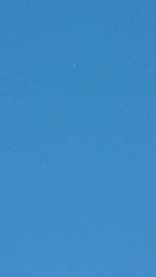 3 witte bollen bij elkaar die samen een steeds groeiende driehoek vormde foto