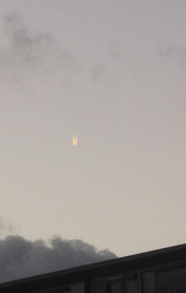 Dalende lichtbol met lichtslieren foto
