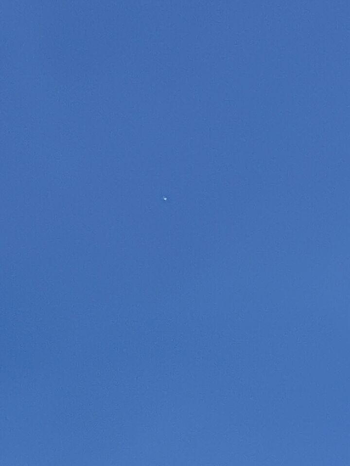 Licht puntje/bol in de lucht foto