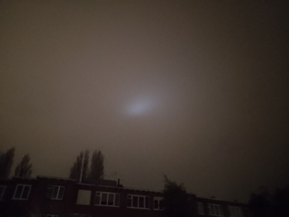 Bewegende witte lichtbollen foto