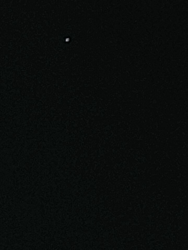 Lichtbol, glinsterde en ging heen en weer erg ver foto