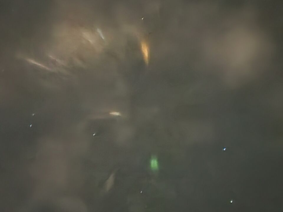 Gekleurde stralen en vlekken als een soort krans foto