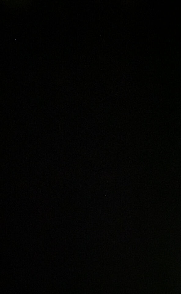 Rij lichtpunten oneven afstand dat met constante snelheid in een baan bewoog. foto
