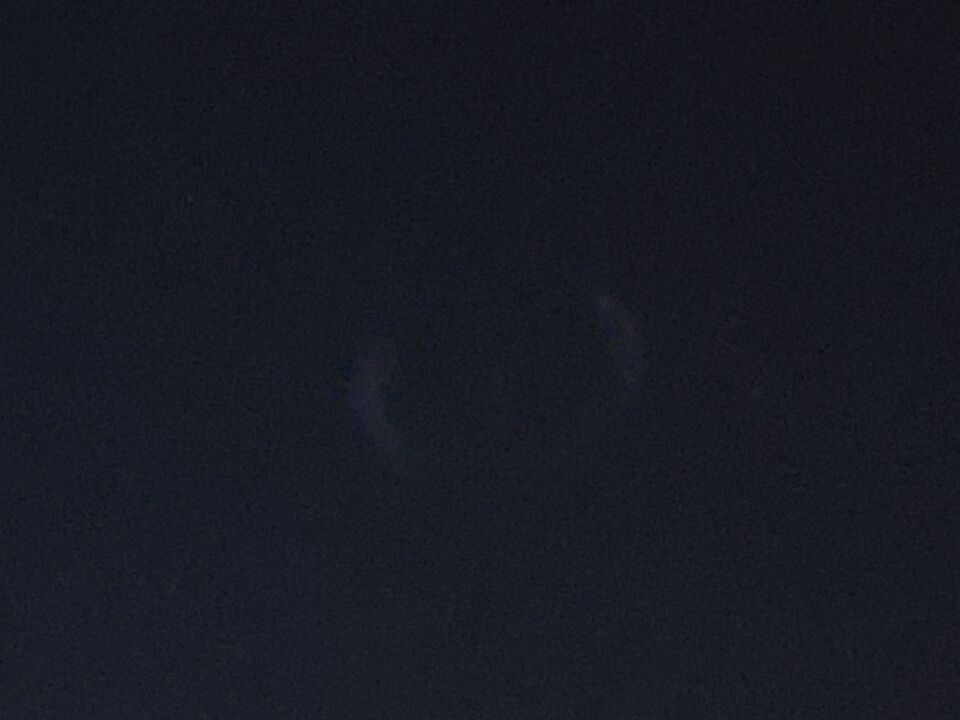 Lichtpunt dat bewoog met 2 halve cirkels foto