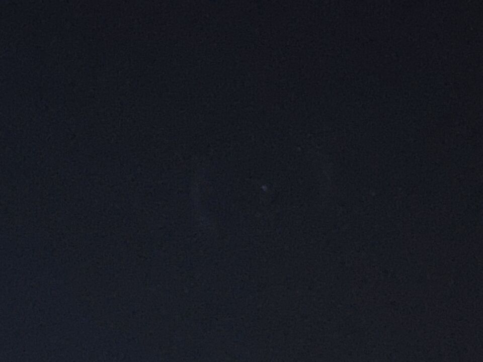 Lichtpunt dat bewoog met 2 halve cirkels foto