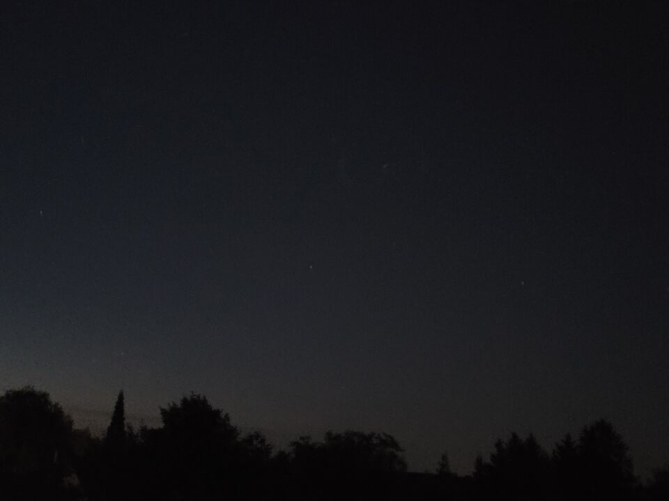 Lichtpunt dat bewoog met 2 halve cirkels foto