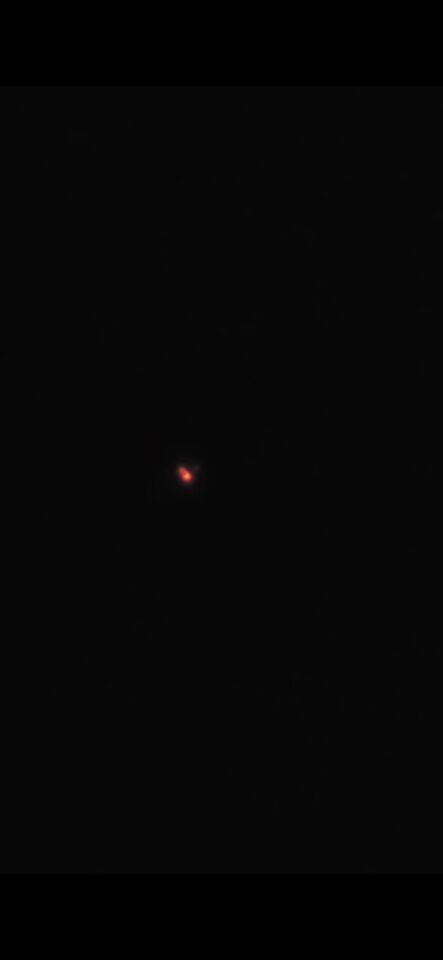 Bewegende rood gele witte lichtjes boven teteringen foto