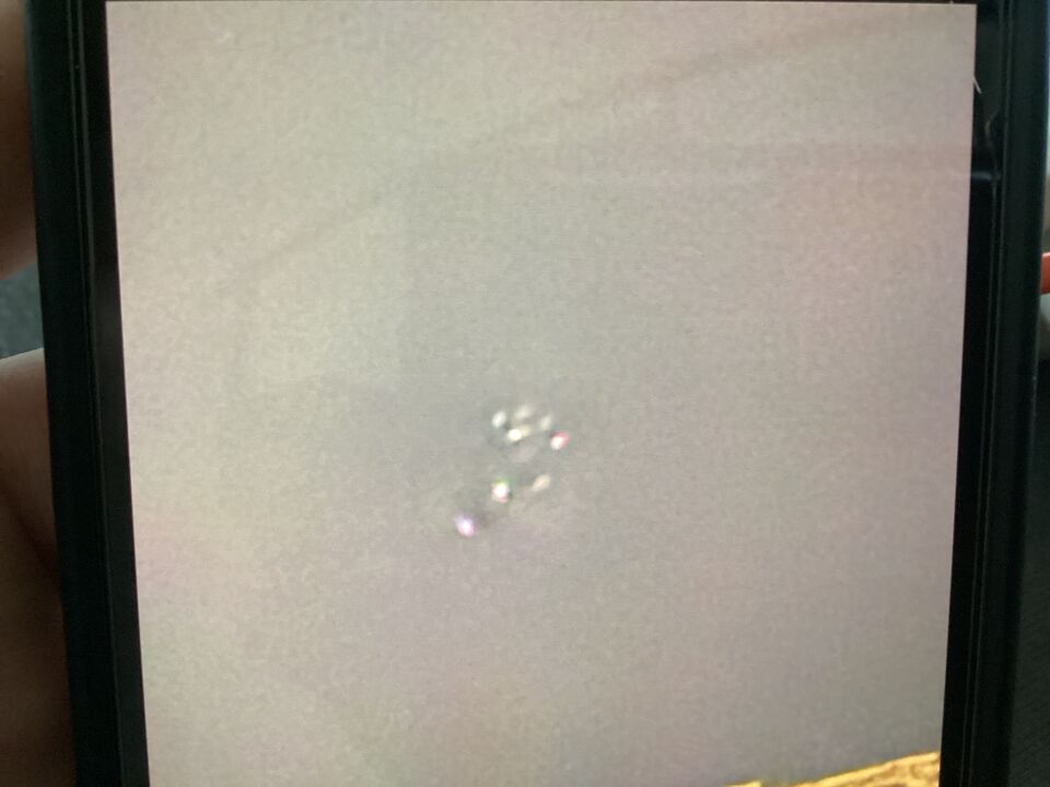 Ufo zichtbaar in de nacht met verschillende lampjes(stilstaand) foto