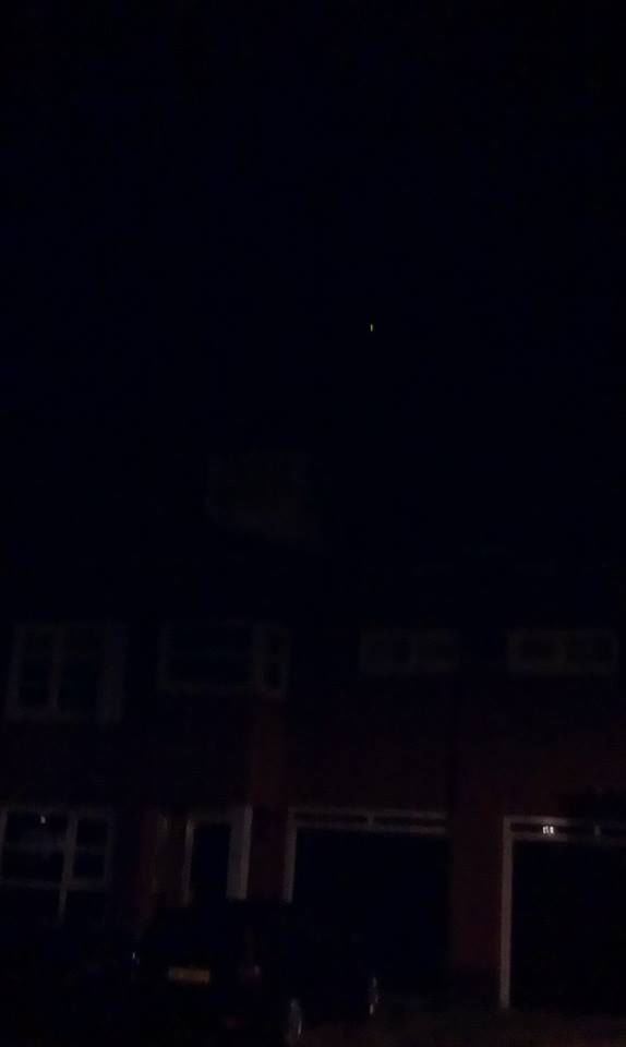 Groen/Rood lichtpuntje boven Hoorn foto