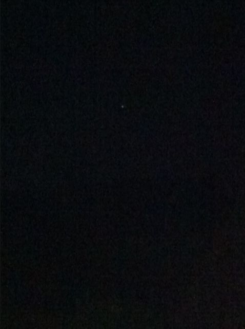 Rood/wit flikkerende bol boven Schoonhoven foto
