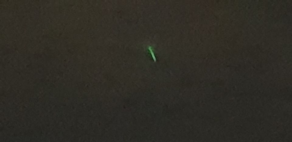 Korte groene lichtstralen foto