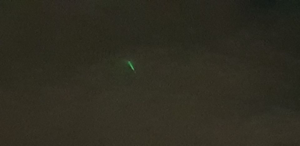 Korte groene lichtstralen foto