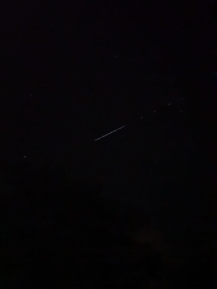 Lange streng lichten +/- 25. In kaarsrechte lange lijn foto