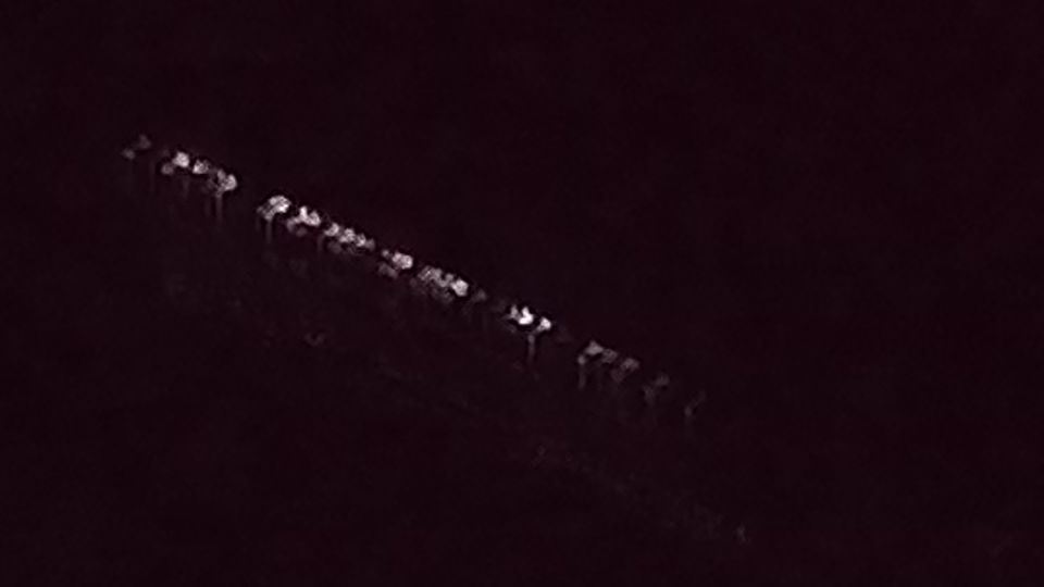 Lange trein van gele/witte lichten foto
