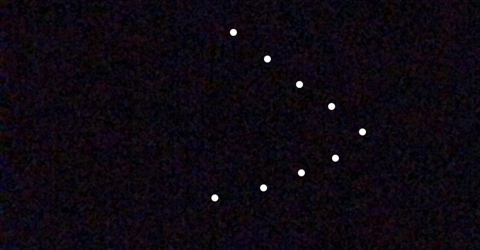 9 lichtjes vliegen in een punt foto